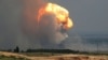Дим і полум'я від вибуху під час пожежі на військовому полігоні в Кіровському районі окупованого Росією Криму, 19 липня 2023 року 