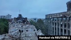 Загальний вигляд будівель, пошкоджених внаслідок російського ракетного удару по житловому будинку у Львові, Україна, 6 липня 2023 року